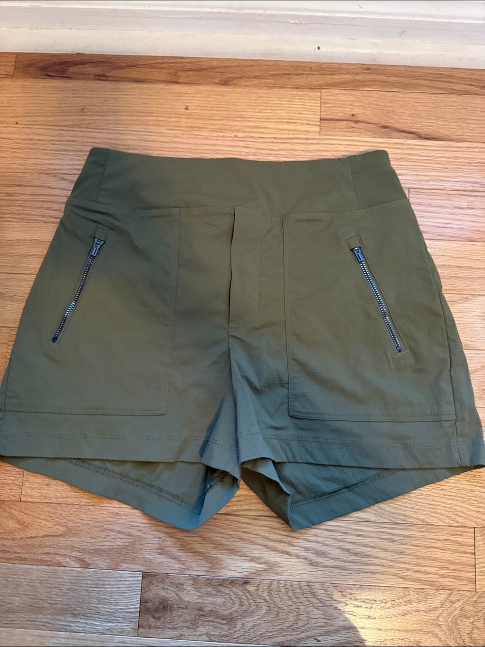 Athleta Olive Green Athletic Shorts with Zip Pockets